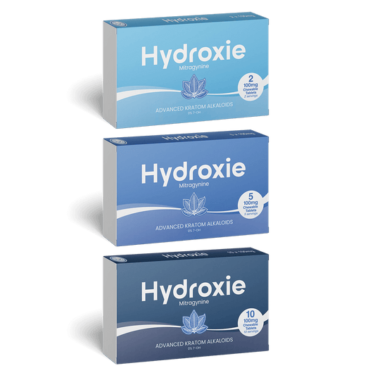 Three boxes of Hydroxie  on a green background